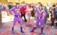 A pair cosplaying the Wonder Twins, complete with bright purple suits and boots, at Dragon*Con 2010. (Photo by WyldKyss via Flickr/Creative Commons https://flic.kr/p/8z5TTu)