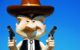 Close-up of a cartoon cowboy statue holding two guns