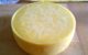 A newly waxed wheel of homemade cheddar cheese. (Photo by Ruth Hartnup via Flickr/Creative Commons https://flic.kr/p/xrEpZT)