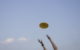 A yellow flying disk heads toward a pair of outstretched hands, trying to catch it. (Photo by nonrev via Flickr/Creative Commons https://flic.kr/p/6Bzgx)