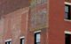 Old painted ads for Coca-Cola and Gold Medal Flour on the side of a red brick building in downtown Concord, NH. (Photo by David Wilson via Flickr/Creative Commons https://flic.kr/p/eTg6Pd)