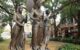 Women's suffrage monument in Knoxville shows three women marching for the right to vote, one of them holding a sign. (Photo by Jill/Blue Moonbeam Studio via Flickr/Creative Commons https://flic.kr/p/LViDvF)