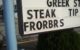 Restaurant sign advertises STEAK FRORBRS