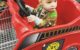 Baby girl drives the fire truck shopping cart