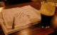 Crossword puzzle and a Guinness (photo by falsecognate via Flickr/Creative Commons)