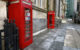 Red phone box in a town square, with another a few paces away. (Photo by It's No Game via Flickr/Creative Commons https://flic.kr/p/zmKNFE)