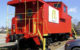 A red caboose with the McDonald's "golden arches" logo on the side. (Photo by Patrick Feller via Flickr/Creative Commons https://flic.kr/p/7Jqn6R)