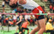 An athlete uses the Fosbury Flop to go over the bar in the high jump at the 2016 Morris County Coaches Invitational, Staten Island, NY. (Photo by Steven Pisano via Flickr/Creative Commons https://flic.kr/p/D9DmEj)