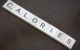 The word CALORIES spelled out in Scrabble tiles. (Photo by Kevin Simmons via Flickr/Creative Commons https://flic.kr/p/SXUptR)