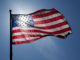 A 50 star US flag illuminated by the sun. (Photo by jnn1776 via Flickr/Creative Commons https://flic.kr/p/8HecPP)