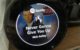 On the screen of the Echo Spot: "Never Gonna Give You Up" by Rick Astley