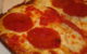 Close up on a corner slice of Detroit-style pizza (photo by joefoodie via Flickr/Creative Commons https://flic.kr/p/7xC35V)