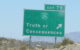 Road sign for the highway exit to Truth or Consequences, NM. (Photo by einalem via Flickr/Creative Commons https://flic.kr/p/4JdVU2)