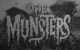 Screenshot of the intro sequence from The Munsters, featuring their big spooky mansion in the background