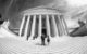 A black and white photo of the Supreme Court building in Washington through a fisheye lens. (Photo by Thomas Hawk via Flickr/Creative Commons https://flic.kr/p/2itUqXh)