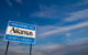 A road sign reads "Welcome to Arkansas, The Natural State: Buckle Up For Safety" (Photo by Stuart Seeger via Flickr/Creative Commons https://flic.kr/p/4iWrAb)