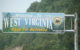 A sign reads "Welcome to West Virginia." (Photo by Jim Kickcox via Flickr/Creative Commons https://flic.kr/p/2wEyVt)