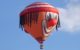 A hot air balloon that's designed to look like the head of a clown. (Photo via Pixabay https://pixabay.com/photos/hot-air-balloon-aviation-clown-face-401143/)