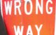 A red road sign that reads "WRONG WAY." (Photo by Malcolm via Flickr/Creative Commons https://flic.kr/p/5mTu9J)