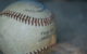 Close up on a scuffed up old baseball. (Photo by Sean Winters via Flickr/Creative Commons https://flic.kr/p/2KQ8kt)