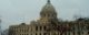 Exterior of the Minnesota state capitol building, on a cloudy day.