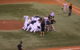 The 2008 Tampa Bay Rays start a dogpile after winning a big playoff game. (Photo by mookiefl via Flickr/Creative Commons https://flic.kr/p/5vCfCS)