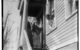 Kids in costumes knock on a door for candy during a Thanksgiving Ragamuffin Parade, between 1910 and 1915. (Photo by Bain News Service via Library of Congress/Flickr/Creative Commons https://flic.kr/p/4id28N)