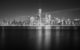 A black and white photo of Lower Manhattan's skyline at night. (Photo by Peter Miller via Flickr/Creative Commons https://flic.kr/p/2n1Ccue)