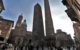 Garisenda and Asinelli Towers in Bologna, Italy. (Photo by Juan Antonio Segal via Flickr/Creative Commons https://flic.kr/p/21ECZwm)