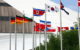 A series of world flags flying at Olympic Square in Montreal. (Photo by Márcio Cabral de Moura via Flickr/Creative Commons https://flic.kr/p/aV1v58)