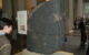 The Rosetta Stone in display in the British Museum, London. Photo by Nichola Czyz, Portable Antiquities Scheme via Flickr/Creative Commons https://flic.kr/p/2ZMZLz)