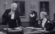 Freddie Frinton and May Warden toast in a scene from "Dinner For One"