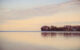 Lake Champlain at sunrise. (Photo by Emma K Alexandra via Flickr/Creative Commons https://flic.kr/p/2pM5cZH)