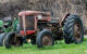 An old tractor in a field. (Photo by Focused 001 via Flickr/Creative Commons https://flic.kr/p/2mV87xt)