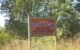 Sign reads "Welcome to Searcy County - Chocolate Roll Capital of the World" (Photo by Jimmy Emerson, DVM via Flickr/Creative Commons https://flic.kr/p/gdmXtN)